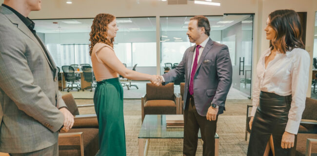 Denver personal injury attorneys meeting with client for free consultation